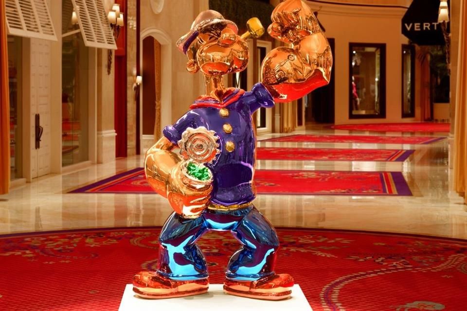 El Popeye original es de acero inoxidable pulido a espejo, actualmente ubicado en la Explanada del Wynn, en Las Vegas.